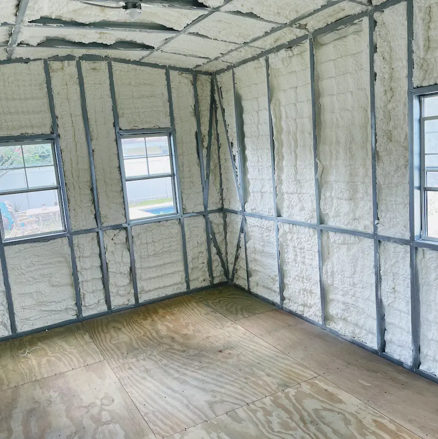 Closed-cell spray foam insulation applied to wall cavities in a residential project in Fallbrook